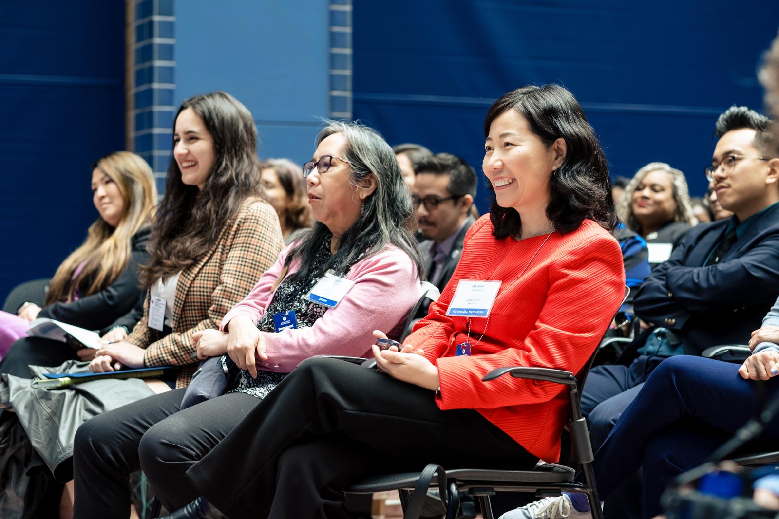 Dr. Lanlan Xu sitting - Howard County Board of Education Candidate